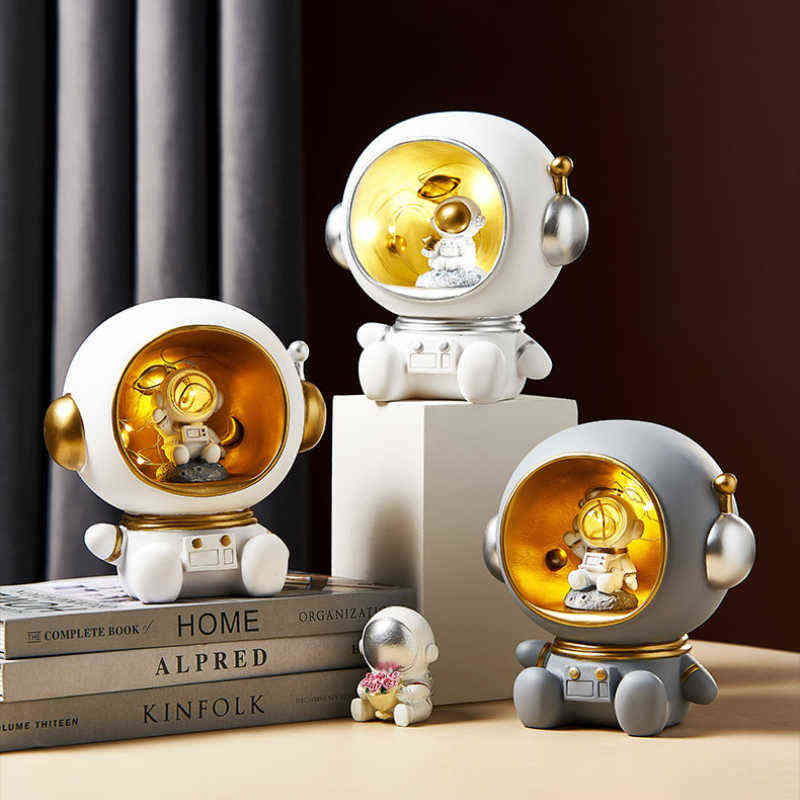 Figurines Figurines Astronaute Carton Sculpture Décoration Night Light Storage Tank Home Decoration Accessoires pour le salon Cadeau d'anniversaire du garçon