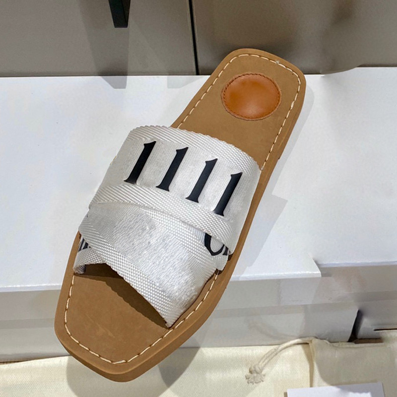 Pantofole di tela di design Donna Muli legnosi Sandali piatti Scivoli in gomma Nuovo colore Bianco Nero Tessuto con scritte in pizzo Scarpe estive da donna all'aperto