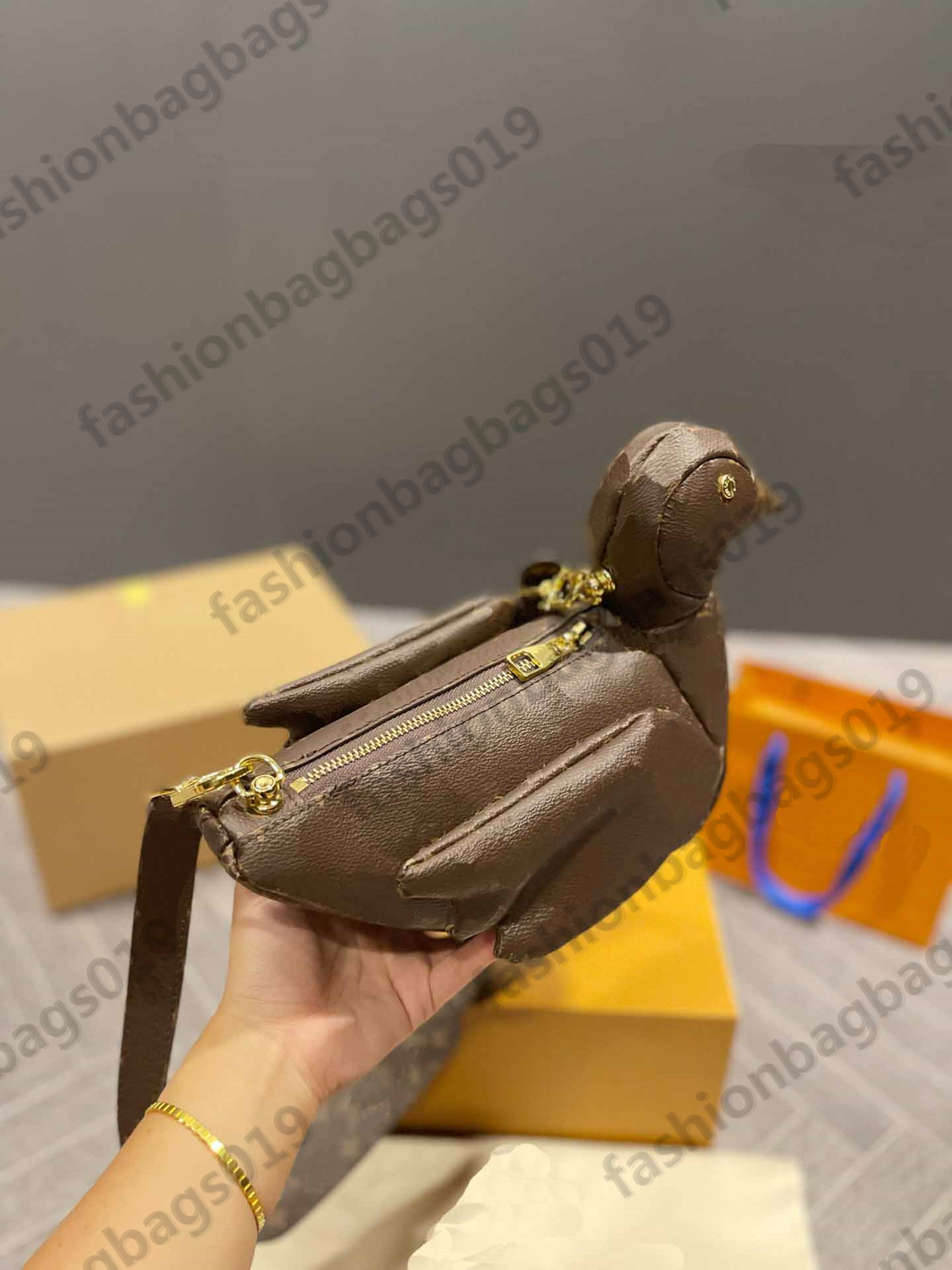 Fashion Explosion DUCK BAG M45990 NIG Heart Shoulder Cross body Totes дизайнеры Роскошные монограммы Печать на холсте Стад-глаза милый игрушечный кошелек