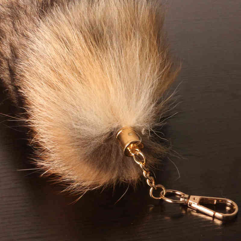 Keychains 40 cm Fox Fur Tail Women's Keychain hanger pluizige sleutelhangers voor vrouwelijke luxe accessoires voor handtassen vrouwelijk idee cadeau meisjes T220909