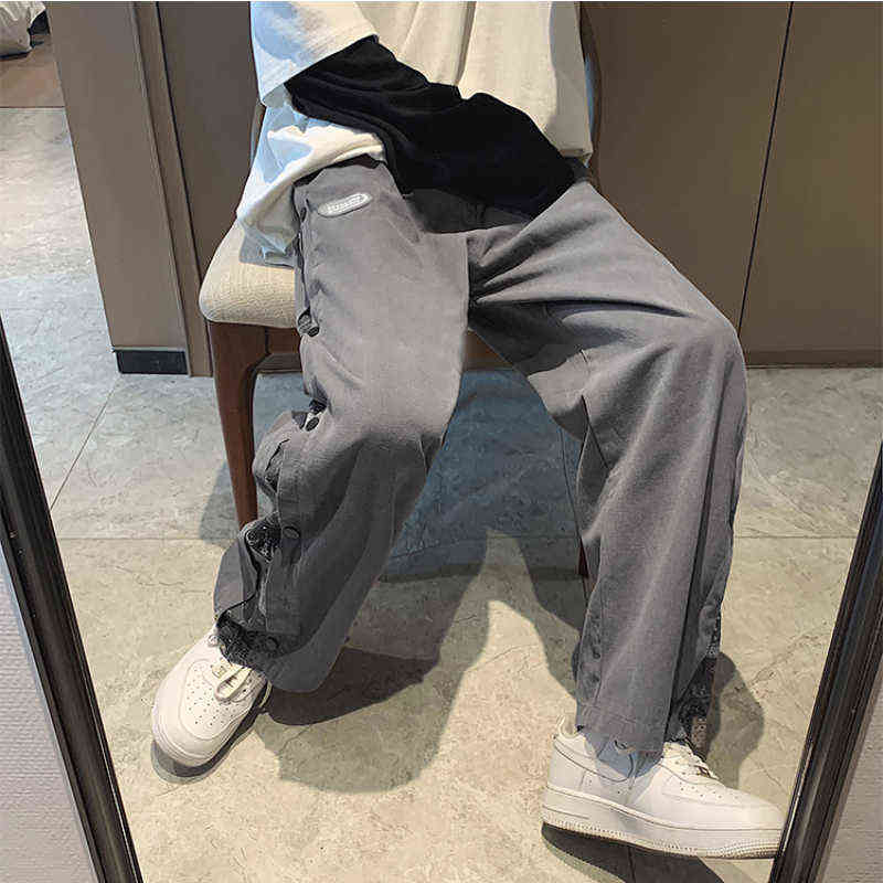 سروال الرجال السراويل غير الرسمية للرجال الخدوش المرقعة للأزياء جميع المباراة على التوالي على الأسلوب الكوري على التوالي سراويل الساق على نطاق واسع