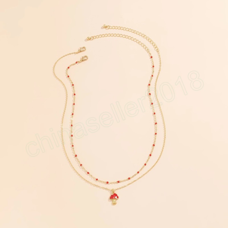 Collier clavicule en métal Double couche pour femmes, rétro créatif, perles rouges, pendentif champignon, bijoux à la mode pour filles