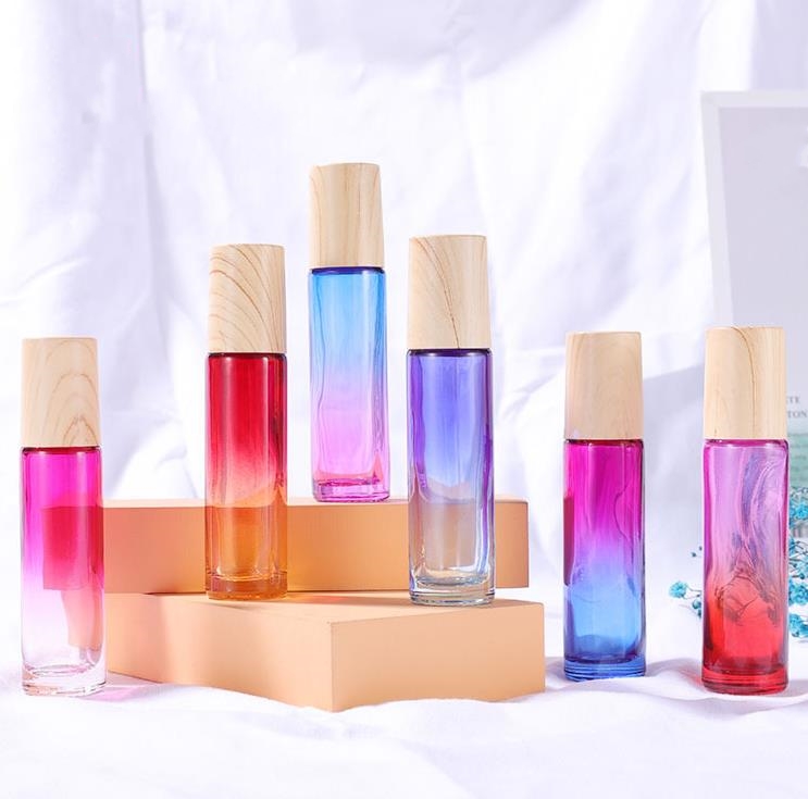 10ml Cam Şişeler Üzerinde Rulo Esansiyel Yağ Parfüm Şöhretli Gradyan Renk Silindir Bottles Ahşap Tahıl Kaplı Paslanmaz Çelik Toplar Roll-On Biberonya SN4138