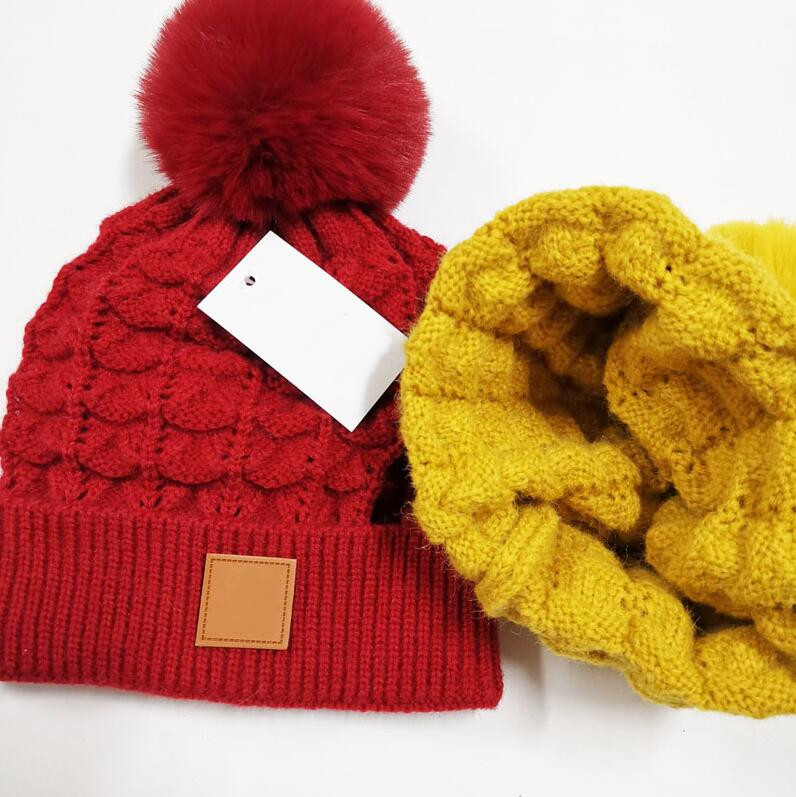 Diseñador Pom Poms Beanie Caps Calidez Sombreros de invierno Hombres Mujeres Bonnet Moda Sombrero de punto Gorro de lana cálido Gorros