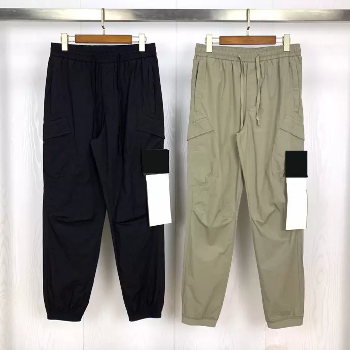 22SS Spring STONE Moda Hombres Pantalones de algodón Brújula básica Insignia Bordada ISLAND Herramientas Pantalones de bolsillo Pantalones deportivos 091512