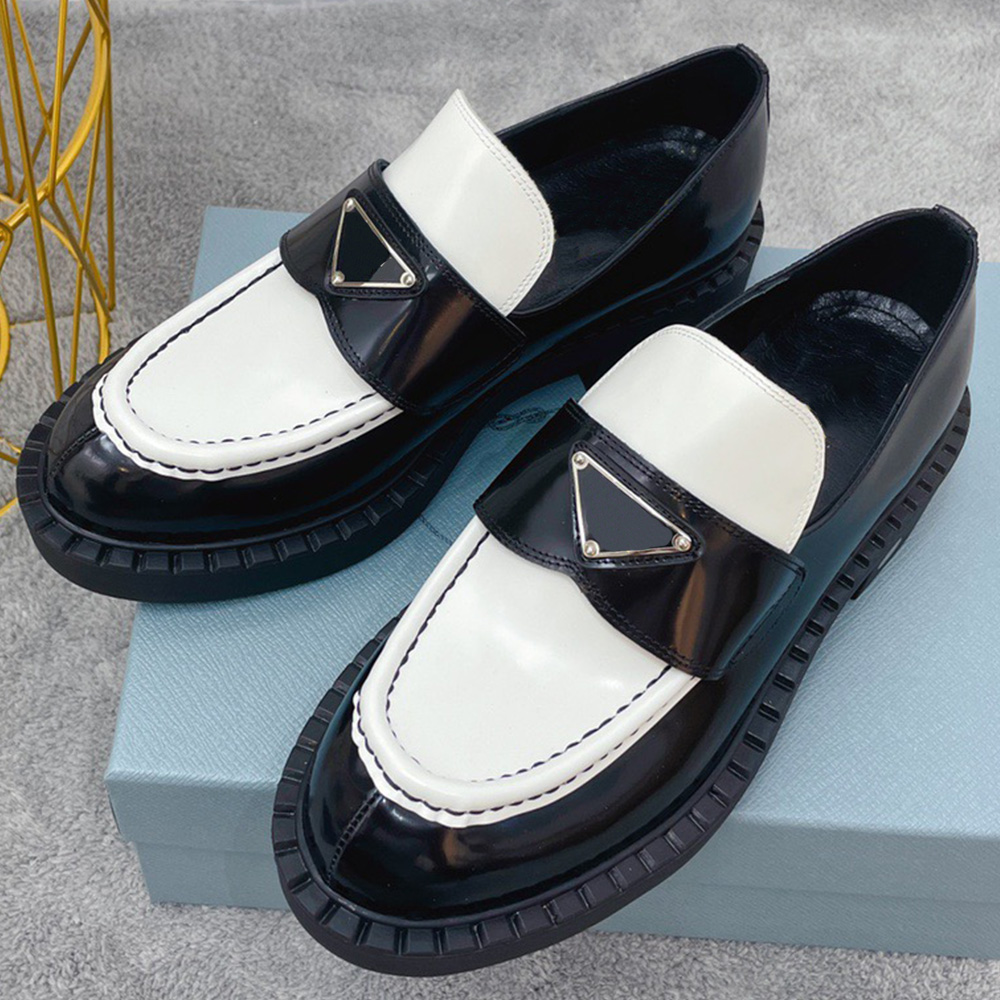 Chocolate brushed leather loafers shoes reinterpreted in unexpected designs throughout collection to create a mix of designer loafers that embody brands duality