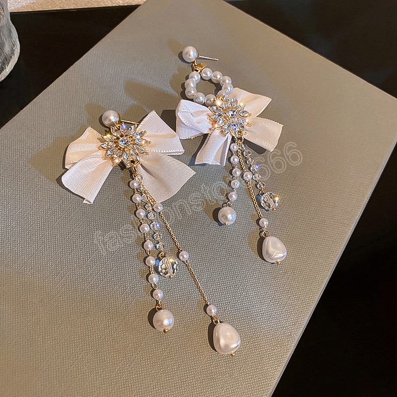 Orecchini pendenti con perle d'imitazione barocche francesi Moda semplice asimmetrico Bowknot Nappa Orecchini di cristallo Gioielli da donna Regali