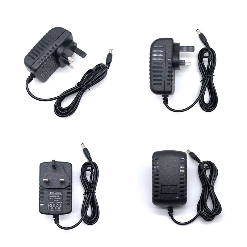 9V 2A DC/Wechselstromnetzteil ABAP-Adapter 110-240V Ladeübertragungswandadapter 5,5 x 2,5 mm US/UK/AU/EU LED-LICHT 1M Kabel