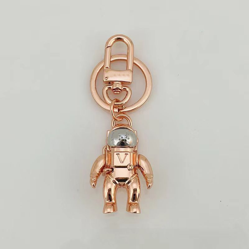 Luxurys designers nyckelring bilnyckelkedja fast färg monogrammade nyckelringar mode fritid astronaut män kvinnor väska hänge accesso3367157