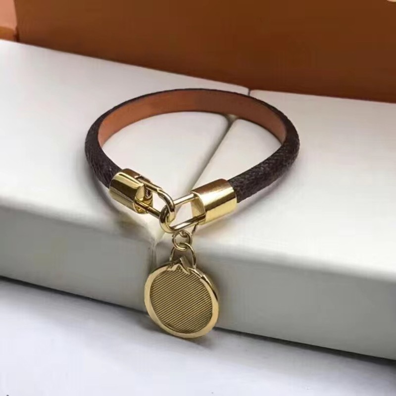 Bracciale in pelle di marca marrone piatto classico di moda donna e uomo Braccialetti con ciondolo in metallo con testa di chiusura, orecchini, bracciali su196Q