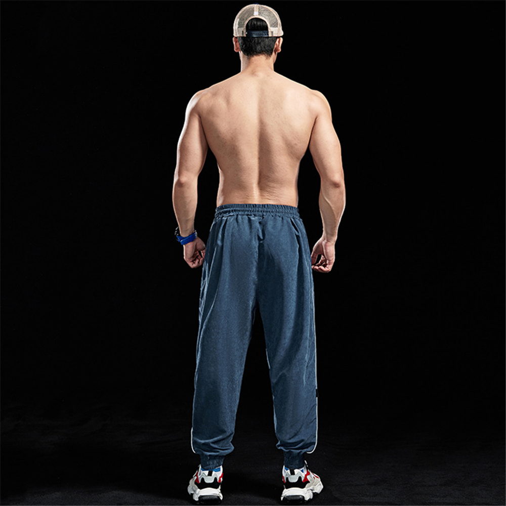 Męskie spodnie luźne fitness modny sport sporty do koszykówki spodnie mięśniowe oddychające ubrania chłopiec chłodny noszenie sportowe 221201