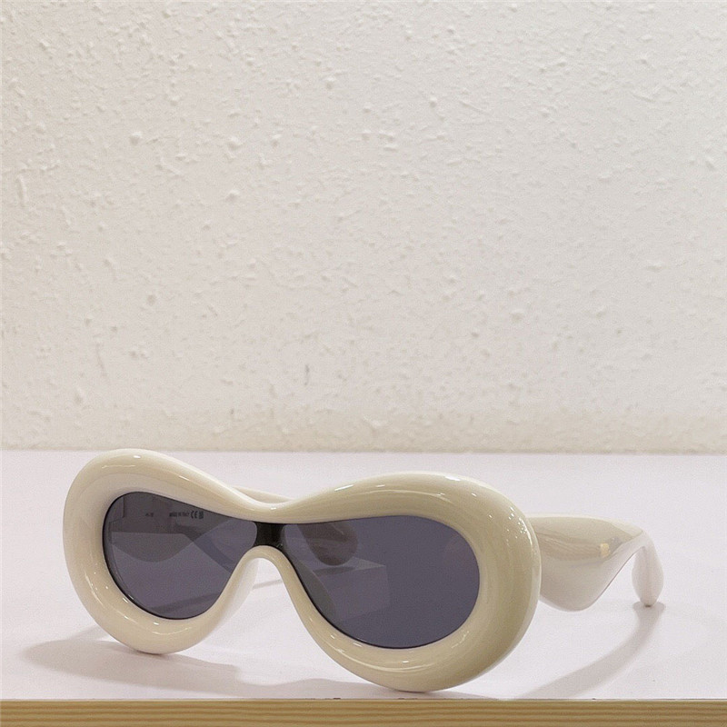 Neue Mode-Sonnenbrille für Männer und Frauen 40099, spezielle Designfarbe, aufgeblasener Maskenformrahmen, Avantgarde-Stil, verrückt, interessant, mit Etui