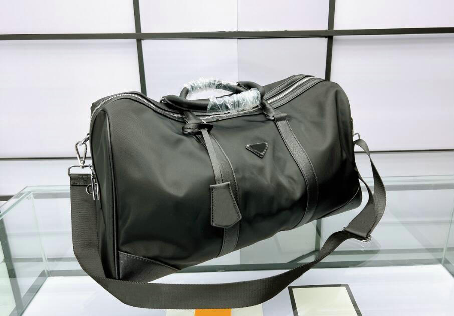 Progettatore di grande capacità Nylon Duffle Borse unisex Unisex grande capacità di campata borse da viaggio pacchetto sportivo nero portatile 156q 156q