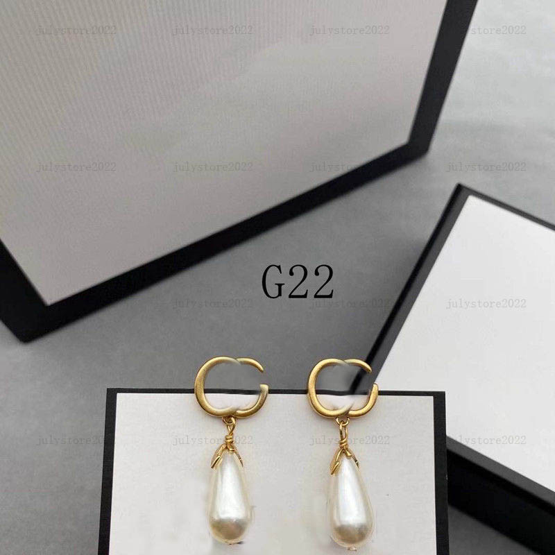 Women stadning Projektanci biżuterii Pearl Ear Studs Luksusowe srebrne obręcze moda złote kolczyki miłosne g bijoux top z pudełkiem226Q