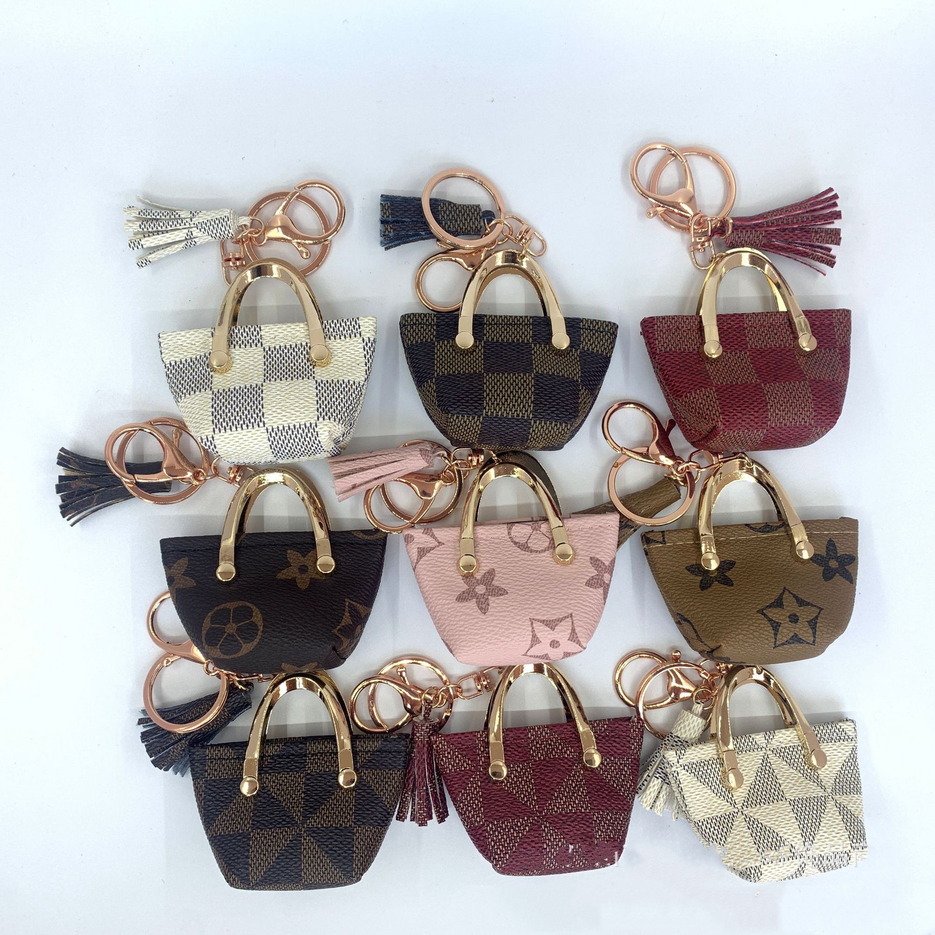 Mini Tote Bag Keychains CAR Llave de llave Anillos Rings Pink Brown Flower Triangle Plaid Tassel Soporte de colgante Monedas Fashion PU Cuero de cuero Accesorios de joyer￭a