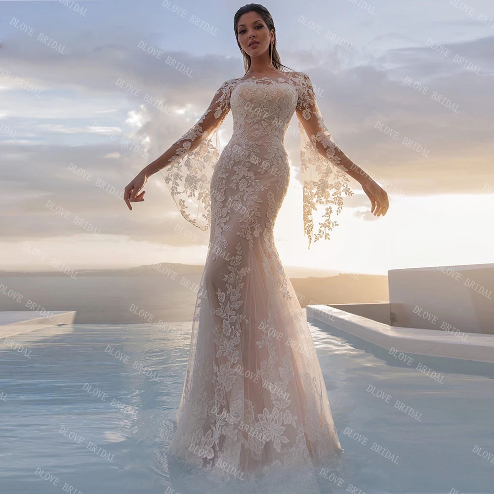 Immagine reale abito da sposa a sirena in pizzo con maniche lunghe svasate 2022 Splendido abito da sposa trasparente con scollo a V realizzato su misura