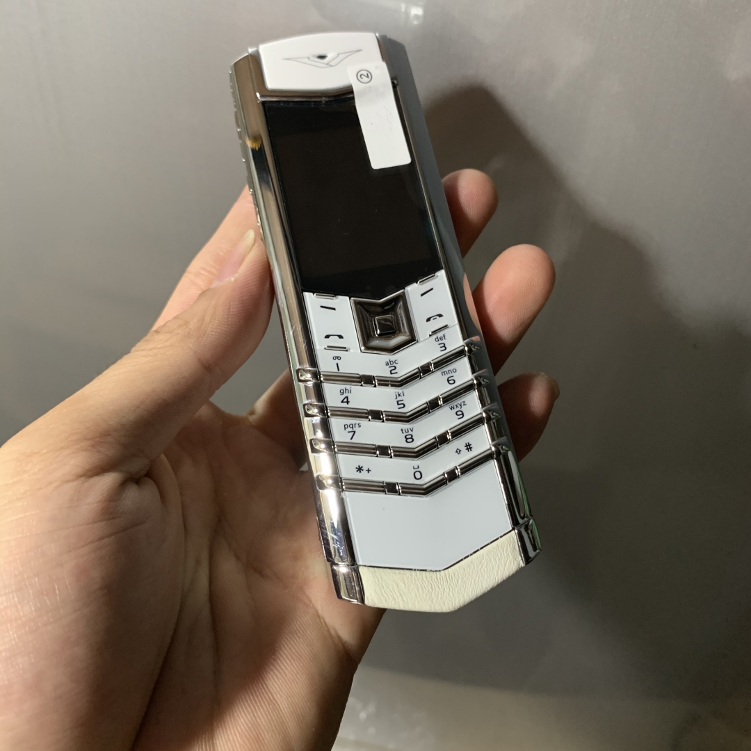 ロック解除された高級ゴールデン携帯電話署名デュアル sim カード携帯電話ステンレス鋼レザーボディ MP3 bluetooth 8800 金属セラミックバック携帯電話