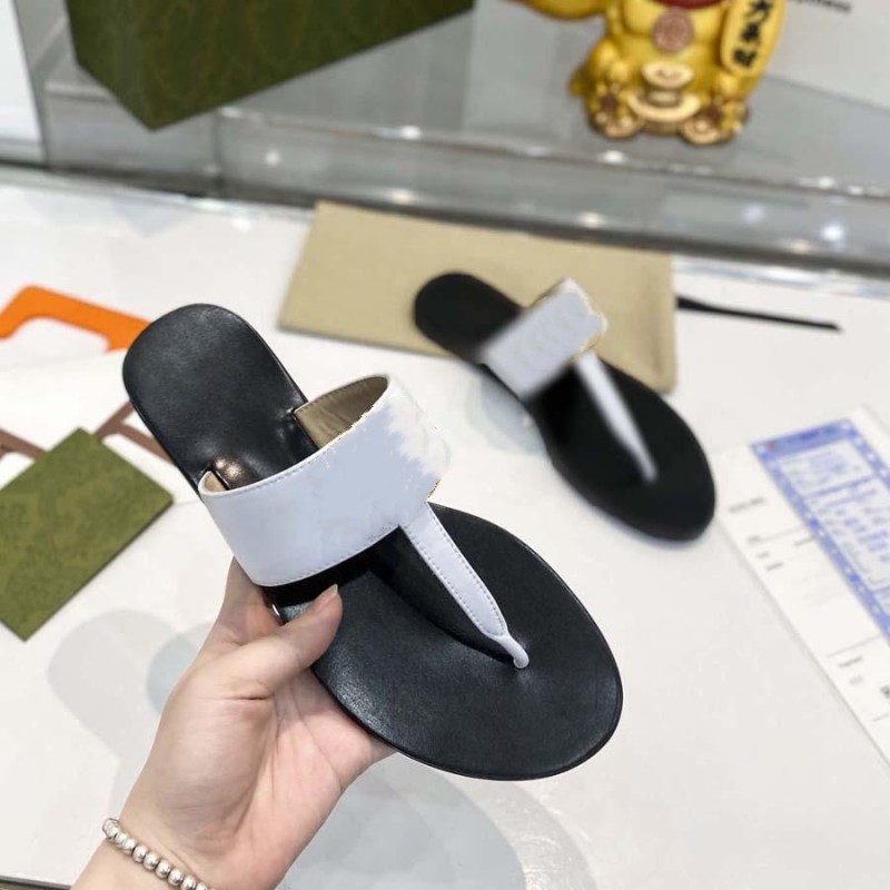 Mannen Slippers Vrouw Schoen Strand Slides Designer Schoenen Sandalen Dame Loafers Flip Flops Zomer Rubberen Bodem Letter Platte Hak Metalen Knop Lazy Luxe Merk Top Leer