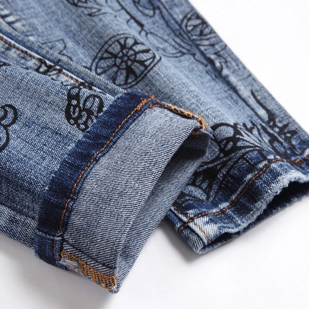 Män jeans blommor tryck jeans mode mönster stretch denim byxor streetwear smal avsmalnande blå byxor
