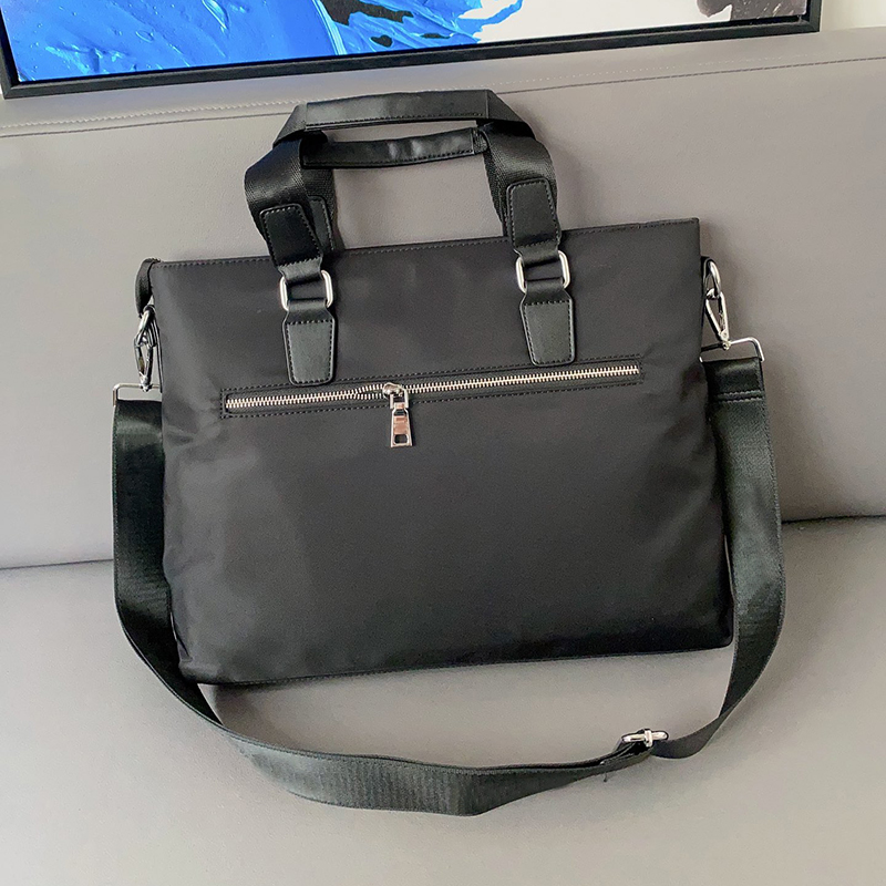 Valigetta di design Borsa laptop in nylon Uomo Donna Borsa da lavoro a spalla Borse da uomo Borsa a tracolla Valigette di marca di lusso Frizione221x