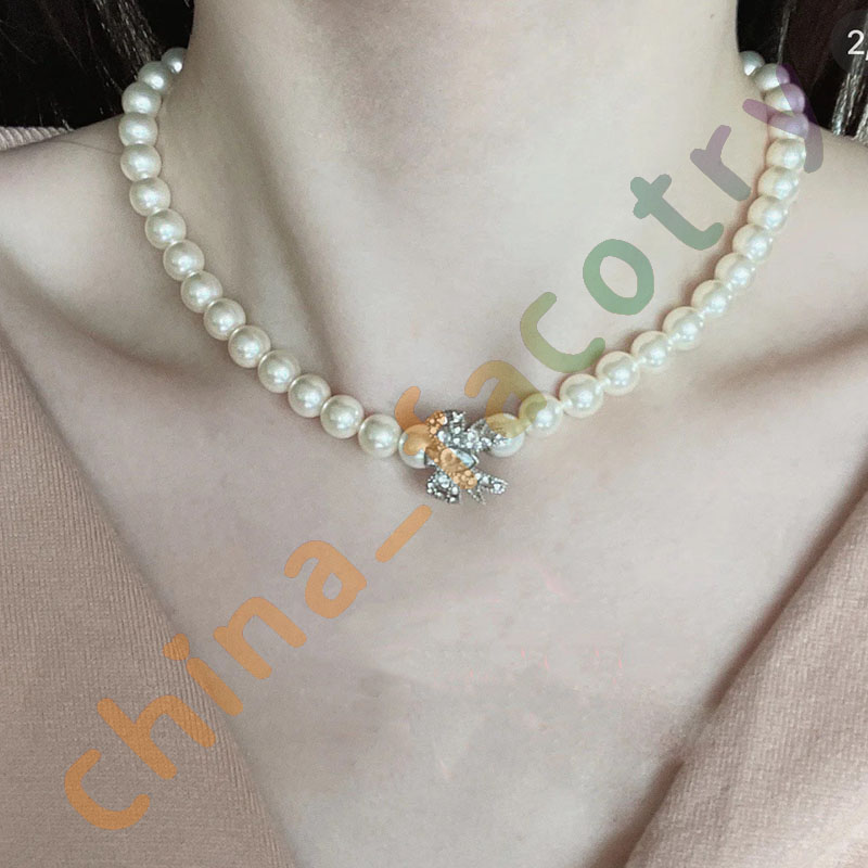 Bijoux de créateur Bowknot Pearl Collier Snap Version Collier Sweet Collier Retro Style Colliers décoratifs5117428