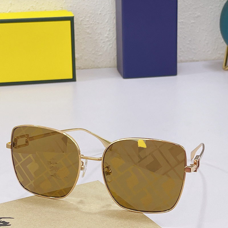 Solglasögon OL006 med bruna linser med logotyp överdimensionerad fyrkantig baguett solglasögon metallguld speglade nyanser ihåliga logotyp lux242t