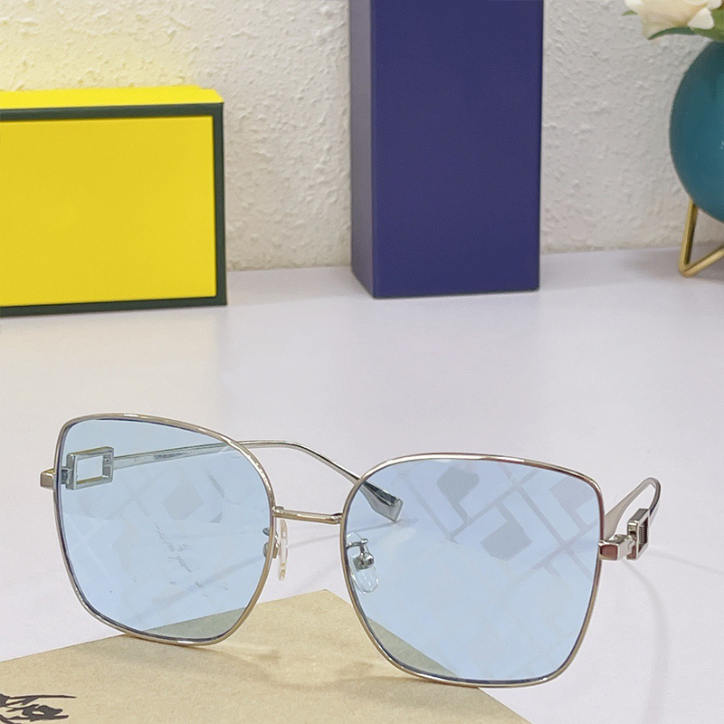 Solglasögon OL006 med bruna linser med logotyp överdimensionerad fyrkantig baguett solglasögon metallguld speglade nyanser ihåliga logotyp lux242t