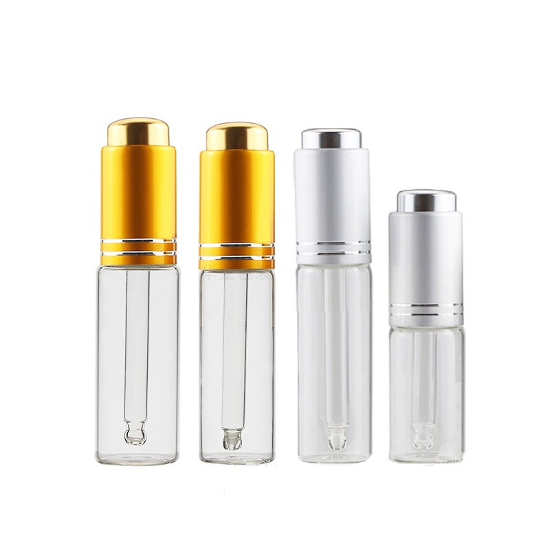 5ml 10ml 15ml 20mlプレスピペットボトルゴールドシルバーリッド空の透明ガラスエッセンシャルオイルドロッパーバイアル化粧品補充可能な容器