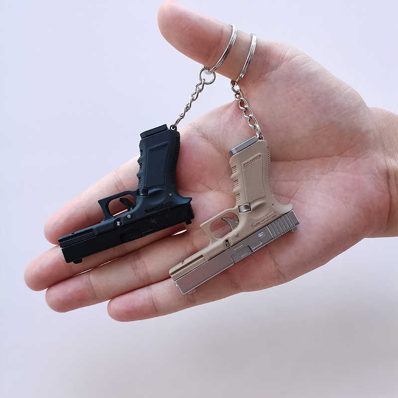 Gun Toys Portable Gun Model Keychain Glock G17 Pistol Shape Keychain Mini Metal PUBG M29F Desert  Shell Ejection Free Assembly T221105