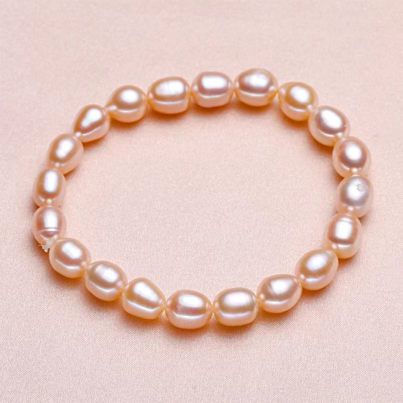 Handel elastisches Seil Perlenstränge Armband natürliche Süßwasserpearl vier Farbauswahl weiß rosa lila Farbe Ellipse Geschenk für Frauen