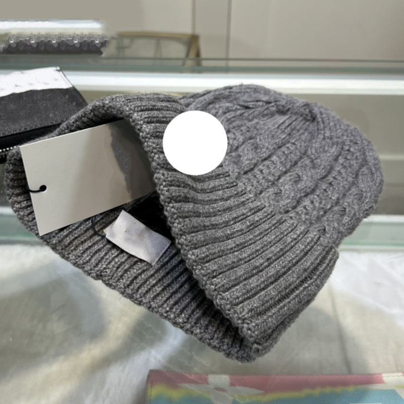 Designer France Skull Caps Badge brodé Chapeaux de laine frisés Chapeau froid pour hommes et femmes Automne et hiver Chaud tricoté 2798