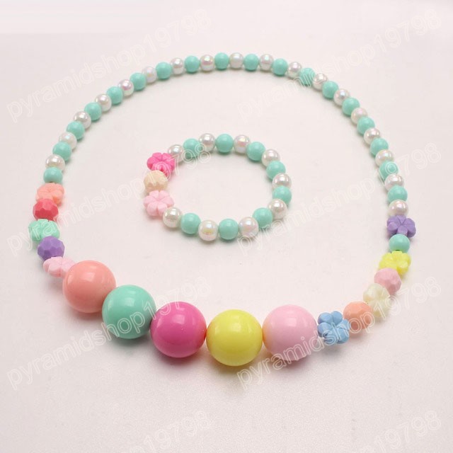 Mode coloré fleur/nœud papillon perles collier Bracelets à la main élastique enfants filles ensemble de bijoux pour cadeau de fête