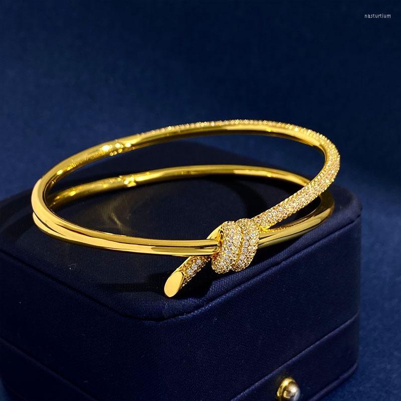 Brazalete diseñado nudo cuerda lleno de diamantes colgante collar de las señoras lujosa cruz anudada diamante pulsera de cadena de las mujeres Earrin232K