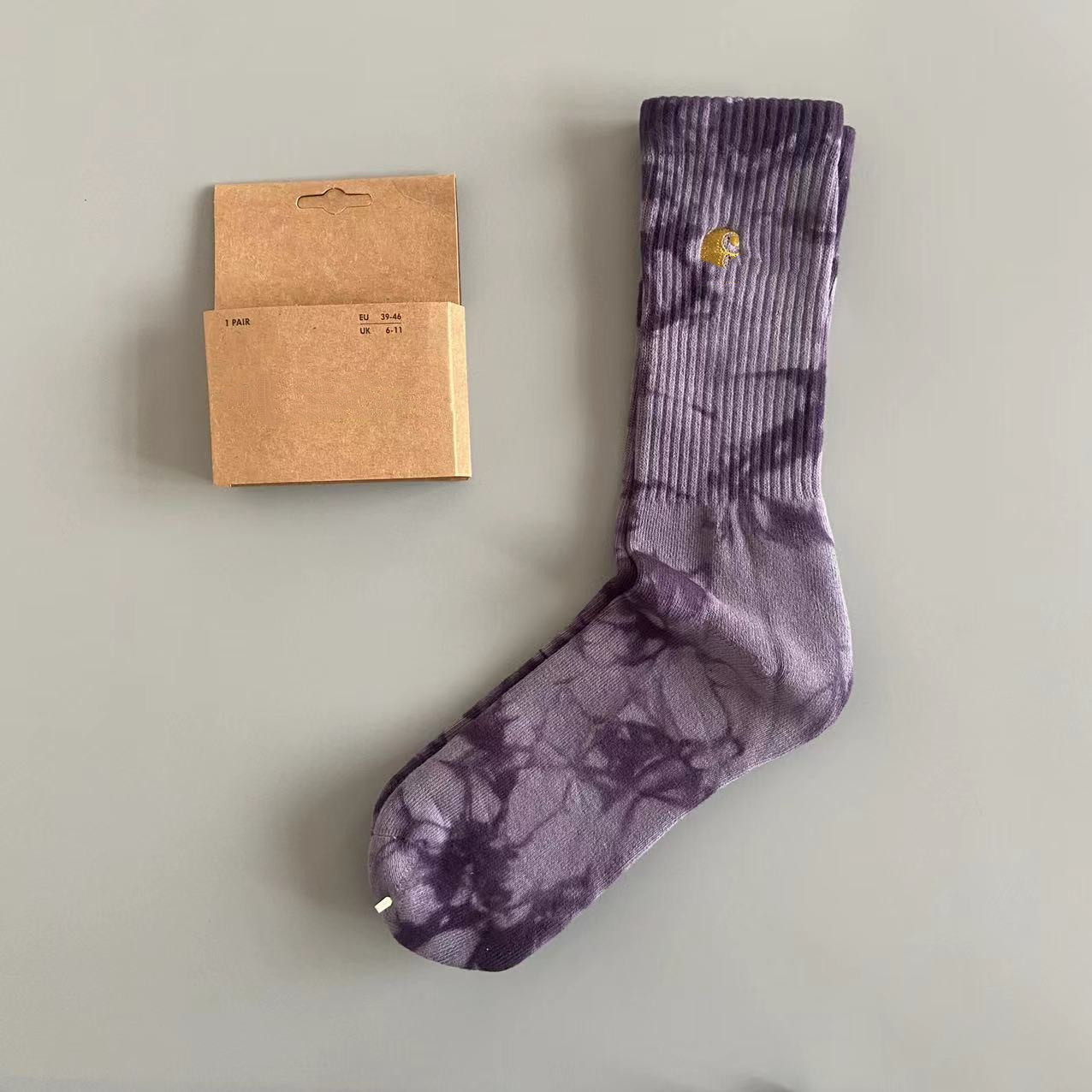 Sokken Die-geverfde mannelijke en vrouwelijke middelste buis Sok Goudlabel geborduurde handdoek Bodem grote sportkousen