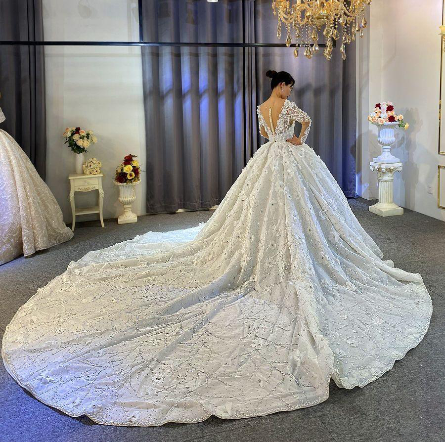 Abito da sposa con fiori 3D Arabia Saudita Abiti da sposa sexy a maniche lunghe con scollo a V trasparenti Abito da sposa romantico Robe De Mariee