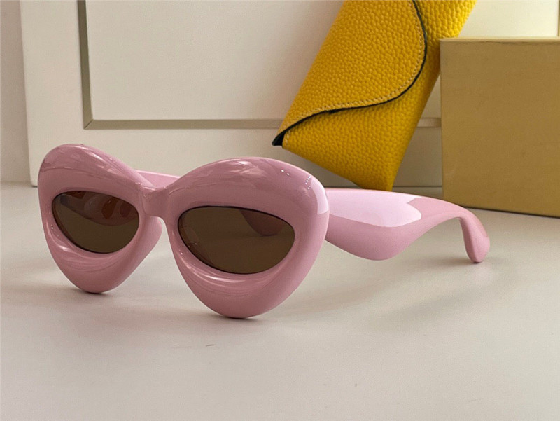 새로운 패션 선글라스 40097 특수 디자인 색상 입술 모양 프레임 아방가르드 스타일 케이스 고급 품질 안경으로 흥미 롭습니다.