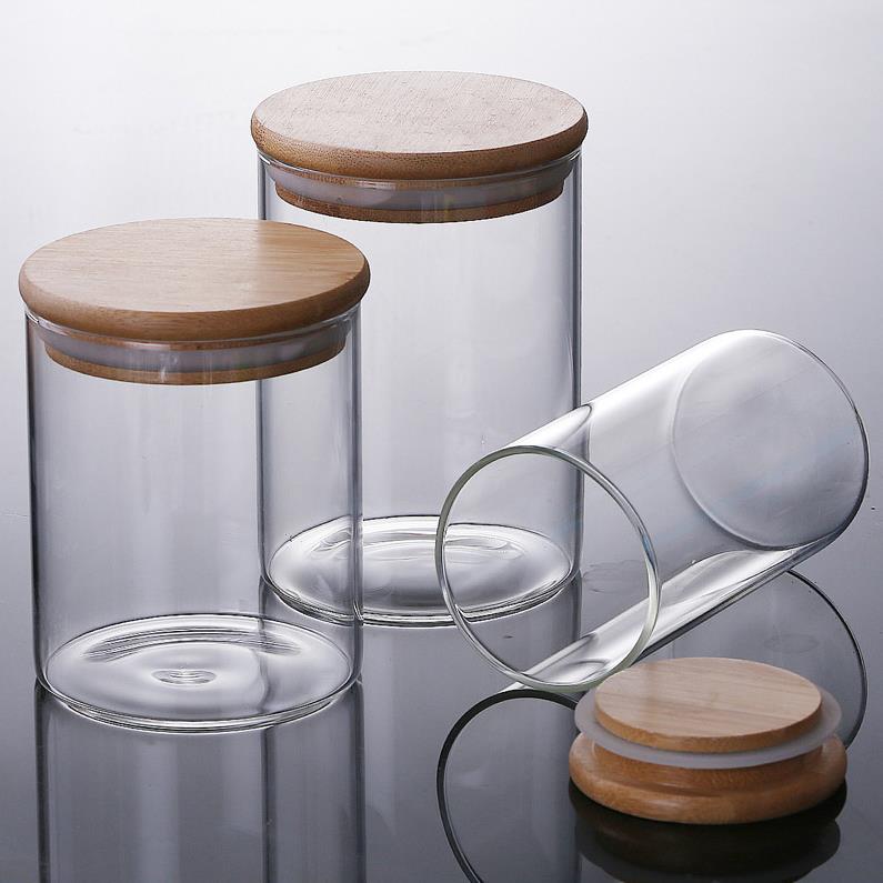 ガラス貯蔵瓶は、気密の竹のふたが積み重ね可能なキッチンキャニスターを備えた透明なガラス食品保管容器