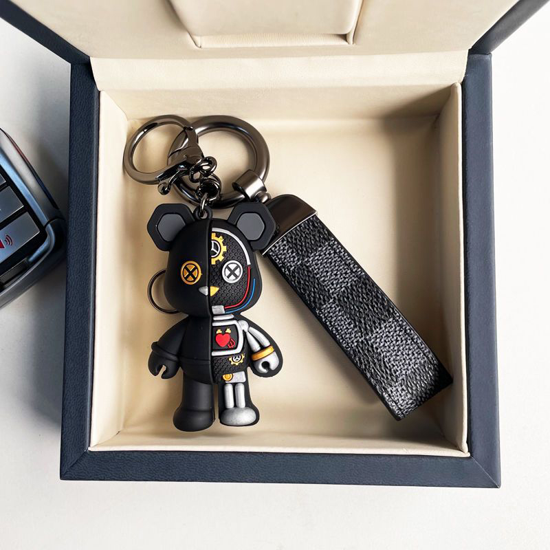 سلسلة Keychain Car Luxurys مصممي السلسلة الرئيسية ألوان صلبة أحادية المفاتيح تصميم الدب بتصميم متعدد الاستخدامات أزياء الترفيه رجال الرجال حقائب القلادة ve