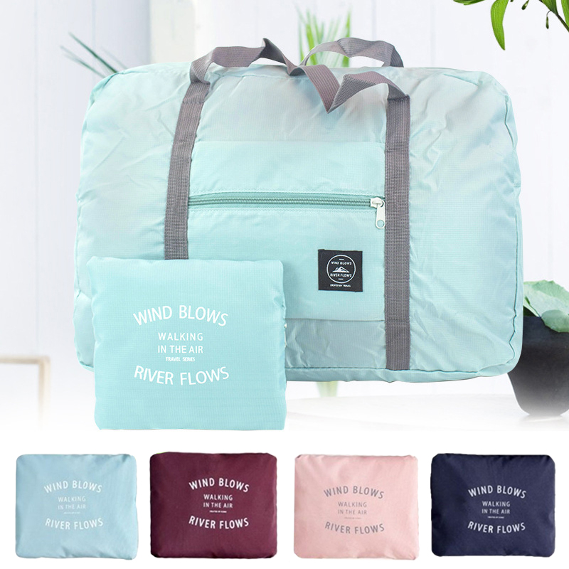 Bolsas de viaje plegables unisex Bag Bag Luggage Mujeres impermeables Bolsos de compras LXL1507
