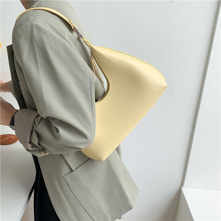 Women's Designer Bags 2023 Women's Hand High Sense of Minority Fashion Arc De Triomphe Armpit Bag New One Shoulder Factory Direct Sales