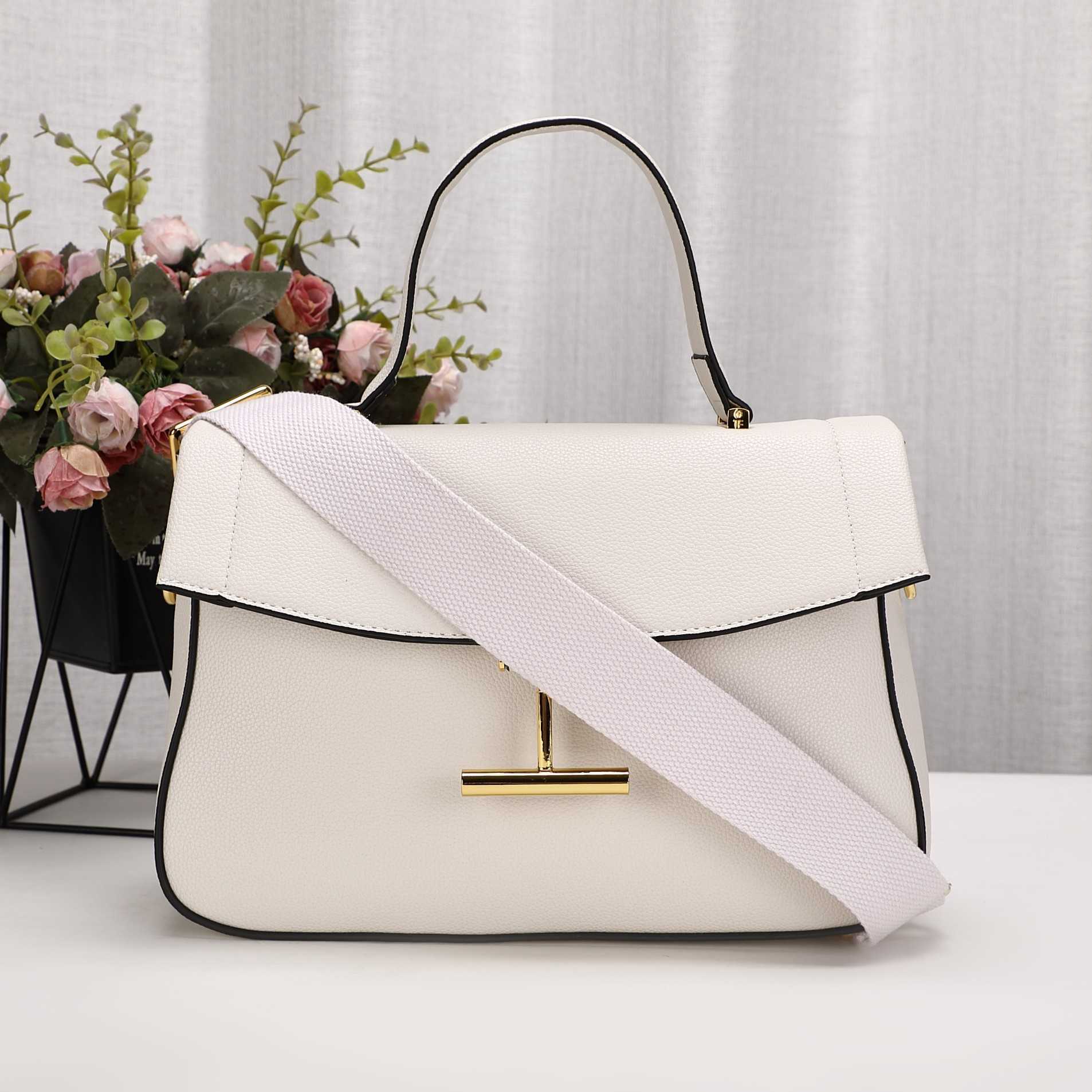 Borse da donna di design di lusso di alta qualità Benessere sul posto di lavoro di alta qualità Madre 2022 Tendenza moda Pelle bovina Killer Semplice pendolare Pochette da sera a mano