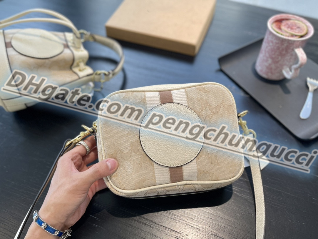 Topp äkta läder canvas Kosmetisk väska Snapshot Modedesigner Damhandväska Berömd minikamera Små Crossbody-väskor Dam Lyxiga Axelväskor Messenger