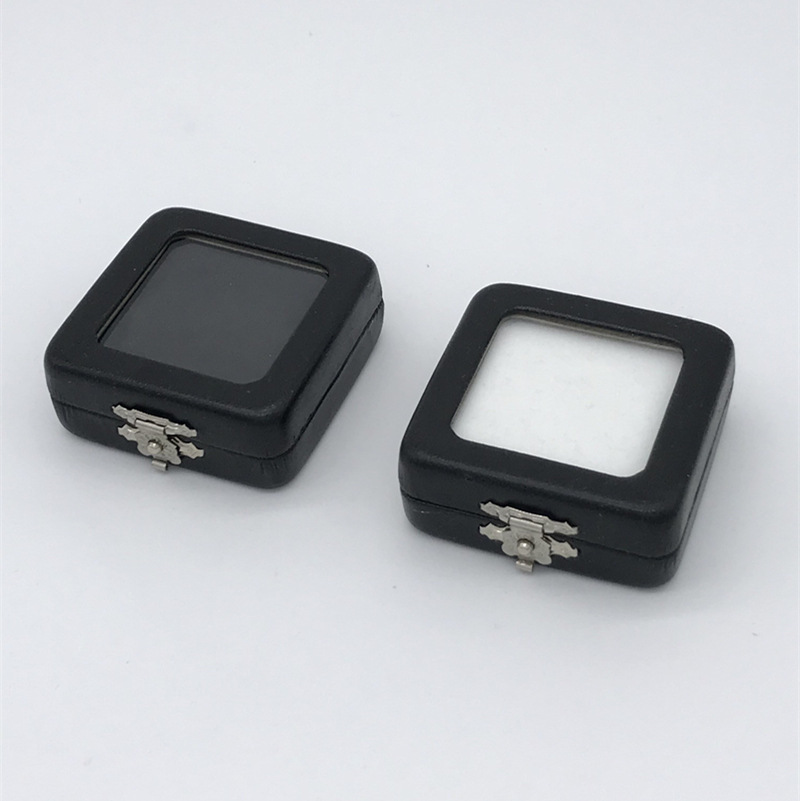 Czarna skóra PU Pudełko z kamieniami szlachetnymi Luźne diamentowe pudełko z biżuterią Pokaż schowek do przechowywania Uchwyt z pokrywkami Gąbka do klejnotów Wyświetlanie monet i prezent