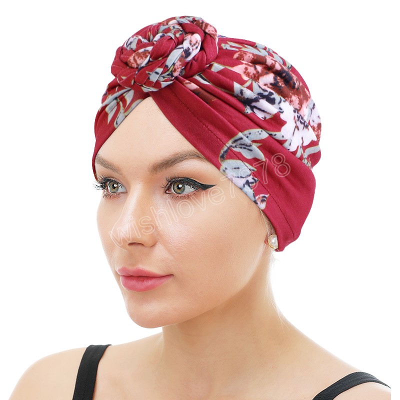 Cappelli di turbante intrecciati stile annodato alla moda Stampa floreale con elastico Doughunt Beanie Ladies Chemio Cap Accessori capelli causali
