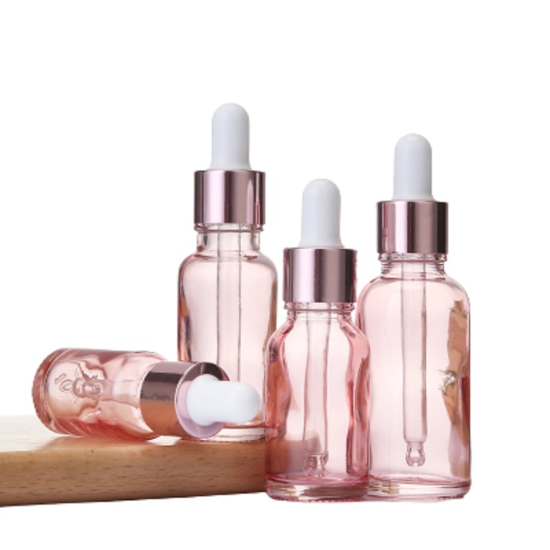 Förpackning klar rosa glasflaska eterisk olje droppar injektionsflaskor rosguld krage vit topp bärbar påfyllningsbar förpackningsbehållare 5 ml 10 ml 15 ml 20 ml 30 ml 50 ml 100 ml