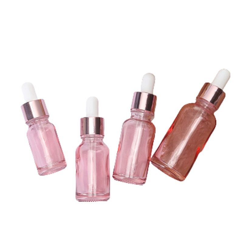 Förpackning klar rosa glasflaska eterisk olje droppar injektionsflaskor rosguld krage vit topp bärbar påfyllningsbar förpackningsbehållare 5 ml 10 ml 15 ml 20 ml 30 ml 50 ml 100 ml