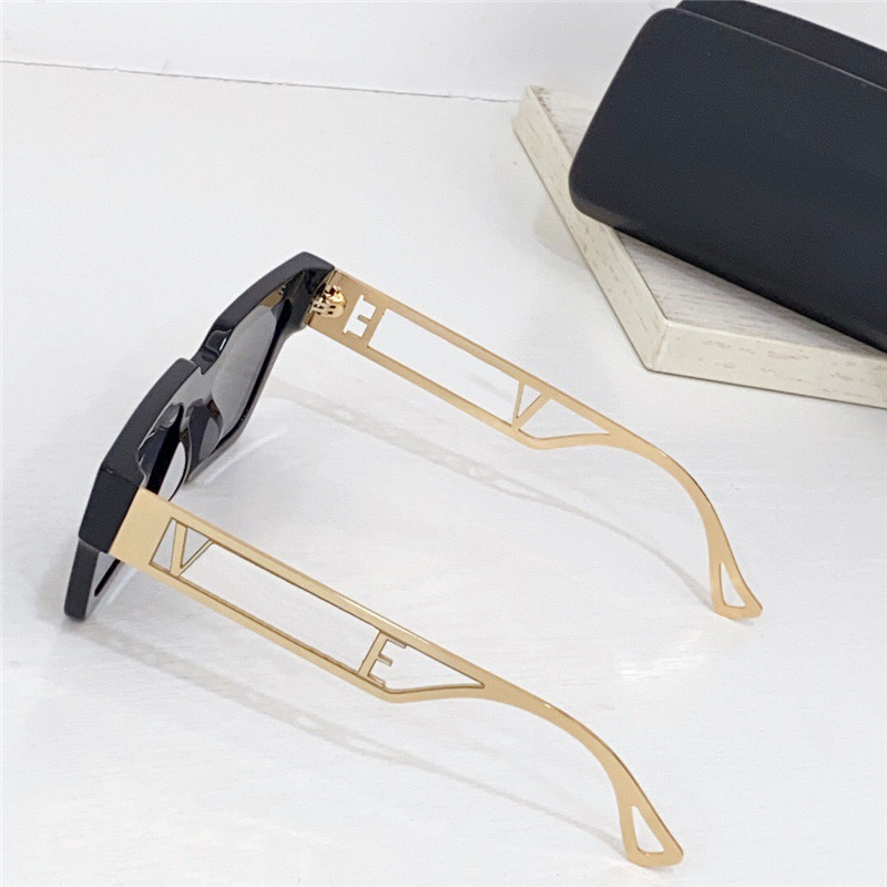 Nouvelles lunettes de soleil design de mode 4431 grandes lettres de cadre d'oeil de chat branches en métal creux style polyvalent et populaire en plein air uv400 protec260K