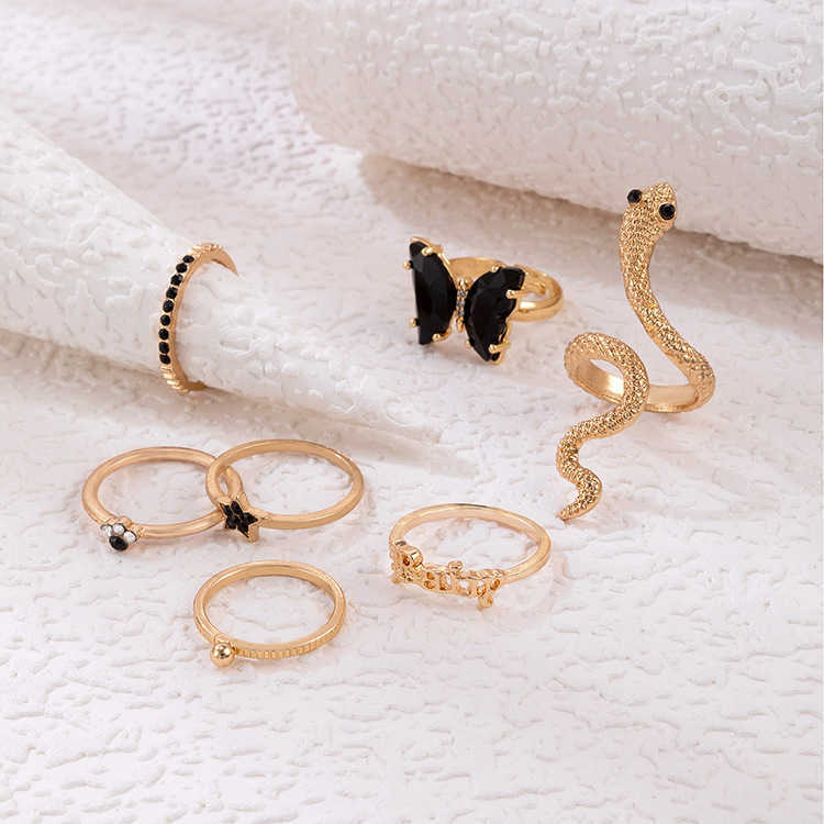 Nuovo set di anelli di diamanti con lettera a farfalla Set di anelli a sette pezzi con stella di serpente geometrica