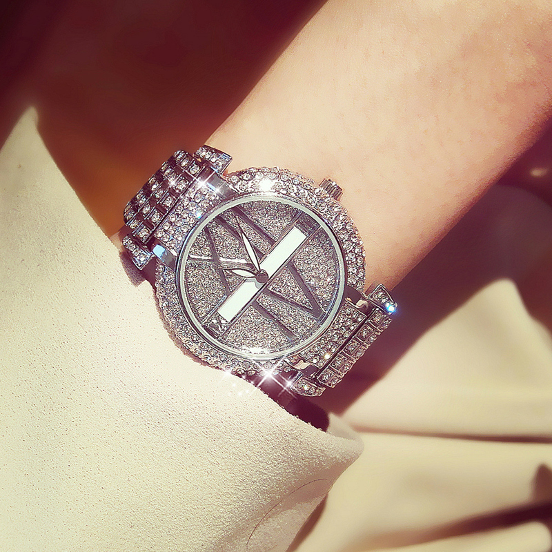 女性の時計豪華なダイヤモンドの女性時計ファッションステンレススチールブレスレットリストウォッチ女性デザインクォーツ時計時計Rel32J