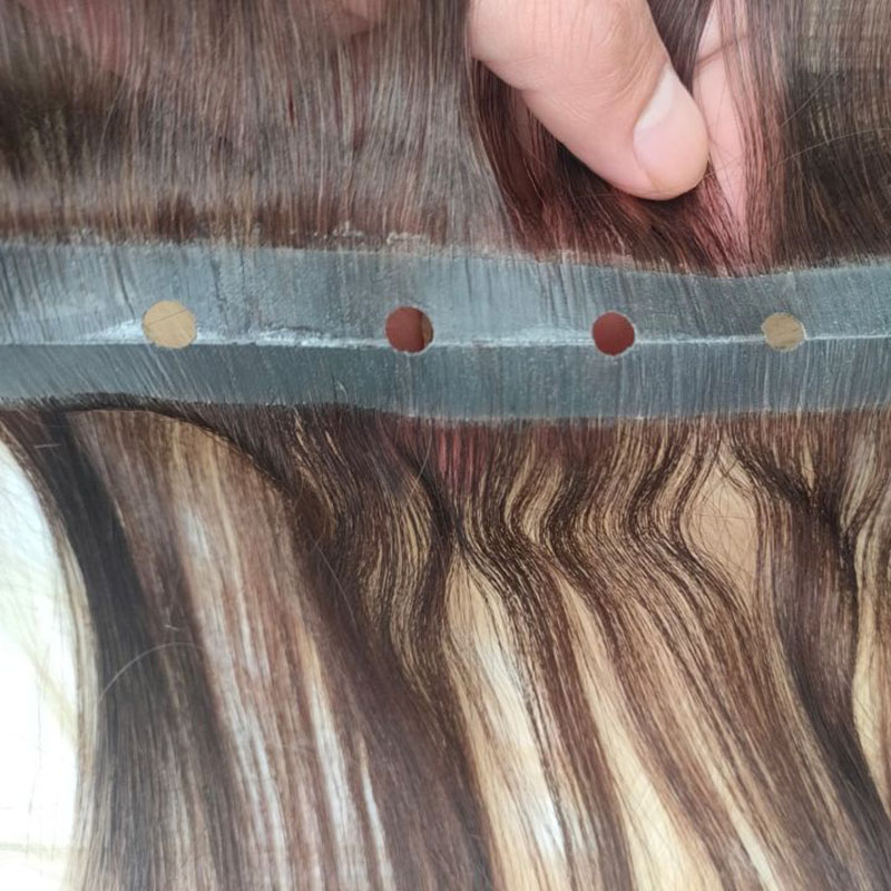 Mais vendido cabelo de trama de pele remy 100 gramas fita de cabelo europeu em extensões de cabelo humano com furos 100g 3 peças